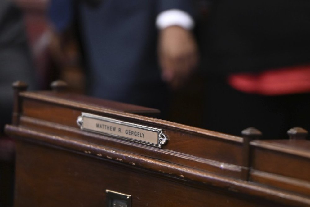 FILE - The desk of hospitalized Pennsylvania state Rep. Matt Gergely, D-Allegheny, is empty at the start of the state House's new two-year legislative session, Jan. 7, 2025, in Harrisburg, Pa. Gergely died January 19, leaving his seat vacant and the chamber deadlocked. (AP Photo/Marc Levy, File)