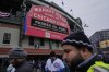 The Wrigley Field marquee is seen before the Chicago Cubs' home-opener baseball game against the San Diego Padres, Friday, April 4, 2025, in Chicago. (AP Photo/Erin Hooley)