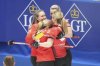 Canada's skip Rachel Homan, left, celebrates with teammates after winning the semifinal match against South Korea at the World Women's Curling Championship in Uijeongbu, South Korea, Saturday, March 22, 2025. (AP Photo/Lee Jin-man)