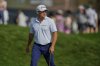 Bud Cauley looks over the 18th green during the third round of The Players Championship golf tournament Saturday, March 15, 2025, in Ponte Vedra Beach, Fla. (AP Photo/Julia Demaree Nikhinson)