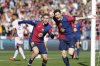 Barcelona's Robert Lewandowski, right, celebrates with Barcelona's Fermin Lopez after scoring during a Spanish La Liga soccer match between Barcelona and Girona in Barcelona, Spain, Sunday, March 30, 2025. (AP Photo/Joan Monfort)