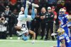 Toronto Argonauts' Dejon Brissett (18) is upended by Winnipeg Blue Bombers' Tyrell Ford (30) during first half CFL football action at the 111th Grey Cup in Vancouver on Sunday, November 17, 2024. THE CANADIAN PRESS/Frank Gunn