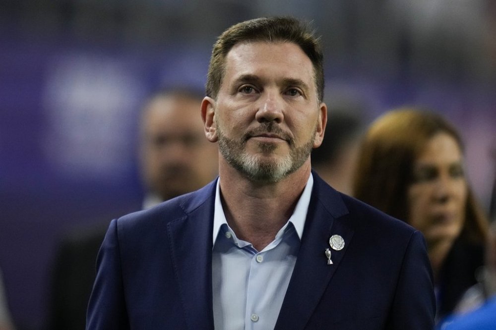 FILE - Alejandro Dominguez, president of CONMEBOL, enters the stadium during a Copa America quarterfinal soccer match between Venezuela and Canada, July 5, 2024, in Arlington, Texas. (AP Photo/Julio Cortez, File)