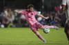 Inter Miami forward Lionel Messi scores his side's first goal during stoppage time in the first half of an MLS soccer match against Toronto FC, Sunday, April 6, 2025, in Fort Lauderdale, Fla. (AP Photo/Rebecca Blackwell)