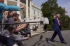 President Donald Trump walks to board Marine One after speaking with reporters on the South Lawn of the White House, Thursday, April 3, 2025, in Washington. (AP Photo/Evan Vucci)