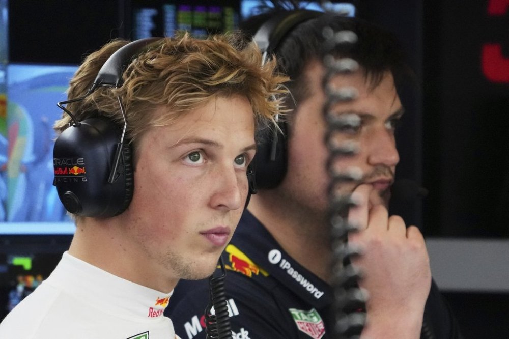 Red Bull driver Liam Lawson of New Zealand waits in his team garage during the third practice session at the Australian Formula One Grand Prix at Albert Park, in Melbourne, Australia, Saturday, March 15, 2025. (AP Photo/Scott Barbour)
