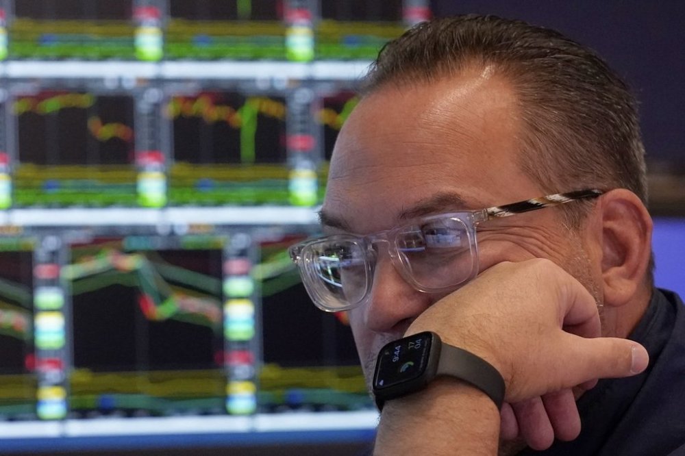 Specialist Anthony Matesic works on the floor of the New York Stock Exchange, Friday, April 4, 2025. (AP Photo/Richard Drew)