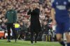 PSG's head coach Luis Enrique reacts during the Champions League round of 16 second leg soccer match between Liverpool and Paris Saint-Germain at Anfield in Liverpool, England, Tuesday, March 11, 2025. (AP Photo/Jon Super)