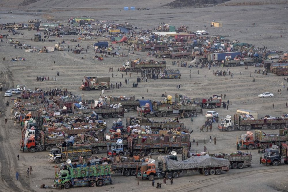 FILE - Afghan refugees settle in a camp near the Torkham Pakistan-Afghanistan border, in Torkham, Afghanistan, Nov. 3, 2023. (AP Photo/Ebrahim Noroozi, File)