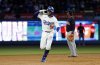 Los Angeles Dodgers' Mookie Betts celebrates after hitting a two-run home run against the Atlanta Braves during the sixth inning of a baseball game Tuesday, April 1, 2025, in, Los Angeles. (AP Photo/Kevork Djansezian)