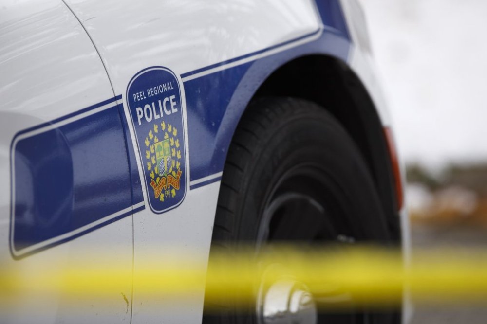 Peel Regional Police signage is seen on a vehicle at a scene in Brampton, Ont., Thursday, Nov. 7, 2019. THE CANADIAN PRESS/Cole Burston