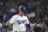Los Angeles Dodgers' Will Smith has seeds thrown at him after hitting a solo home run during the sixth inning of a baseball game against the Detroit Tigers Saturday, March 29, 2025, in Los Angeles. (AP Photo/Mark J. Terrill)