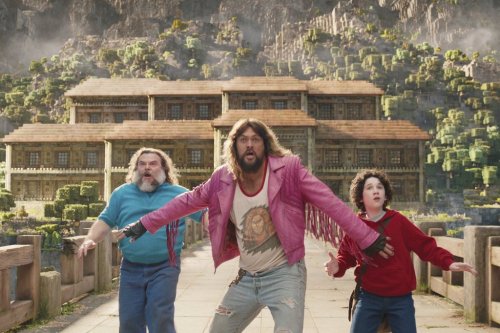 This image released by Warner Bros. Pictures shows, from left, Jack Black, Jason Momoa and Sebastian Hansen in a scene from 