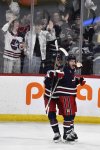 Winnipeg Jets' Nikolaj Ehlers (right) celebrates his game-winning goal in overtime against the Washington Capitals with Mark Scheifele (55) during their NHL hockey game in Winnipeg, Tuesday March 25 2025. THE CANADIAN PRESS/Fred Greenslade