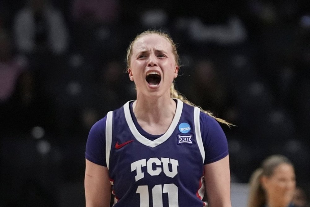 TCU guard Hailey Van Lith (10) reacts after making a 3-point basket to close out the first half against Texas in the Elite Eight of the NCAA college basketball tournament, Monday, March 31, 2025. in Birmingham, Ala. (AP Photo/Gerald Herbert)