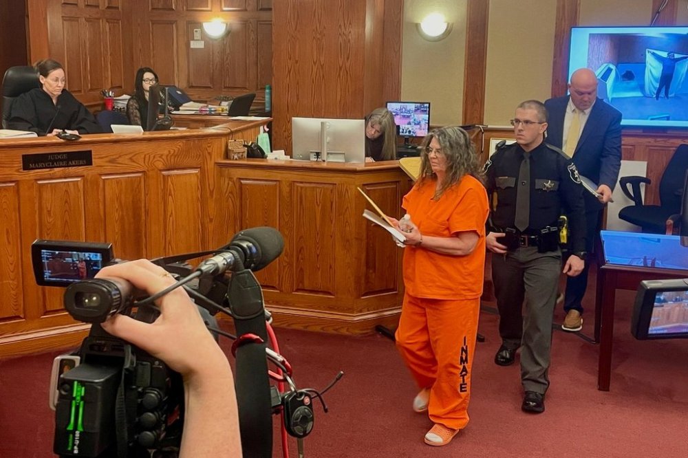 Jeanne Kay Whitefeather is led away after being sentenced to up to 215 years in prison for abusing her adopted children Wednesday, March 19, 2025, in Kanawha County Circuit Court in Charleston, W.Va. (AP Photo/John Raby)