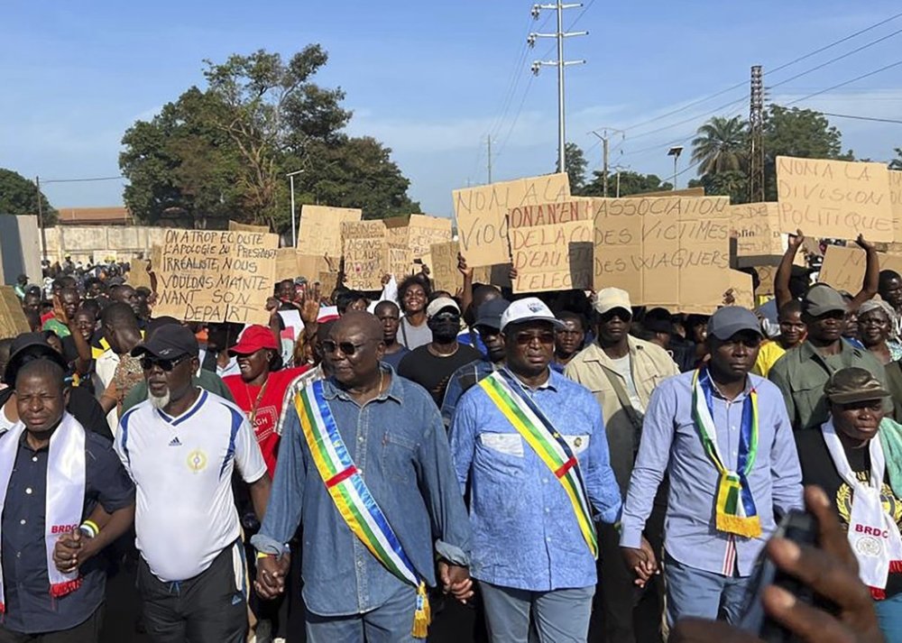 Central African Republic opposition parties demonstrate in the streets of Bangui Friday, April 4, 2025, to protest the government and its use of Wagner mercenaries. (AP Photo/ Jean Fernand Koena)