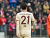 Bayern Munich's Hiroki Ito walks during the Bundesliga soccer match between Bayern Munich and St. Pauli at the Allianz Arena in Munich, Germany, Saturday March 29, 2025. (Peter Kneffel/dpa via AP)