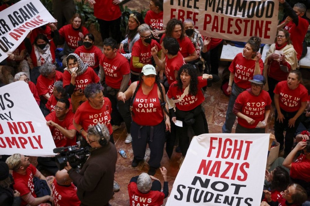 Demonstrators from the group, Jewish Voice for Peace, protest inside Trump Tower in support of Columbia graduate student Mahmoud Khalil, Thursday, March 13, 2025, in New York. (AP Photo/Yuki Iwamura)