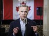 Mark Carney speaks to the media in Calgary, Tuesday, March 4, 2025.THE CANADIAN PRESS/Jeff McIntosh