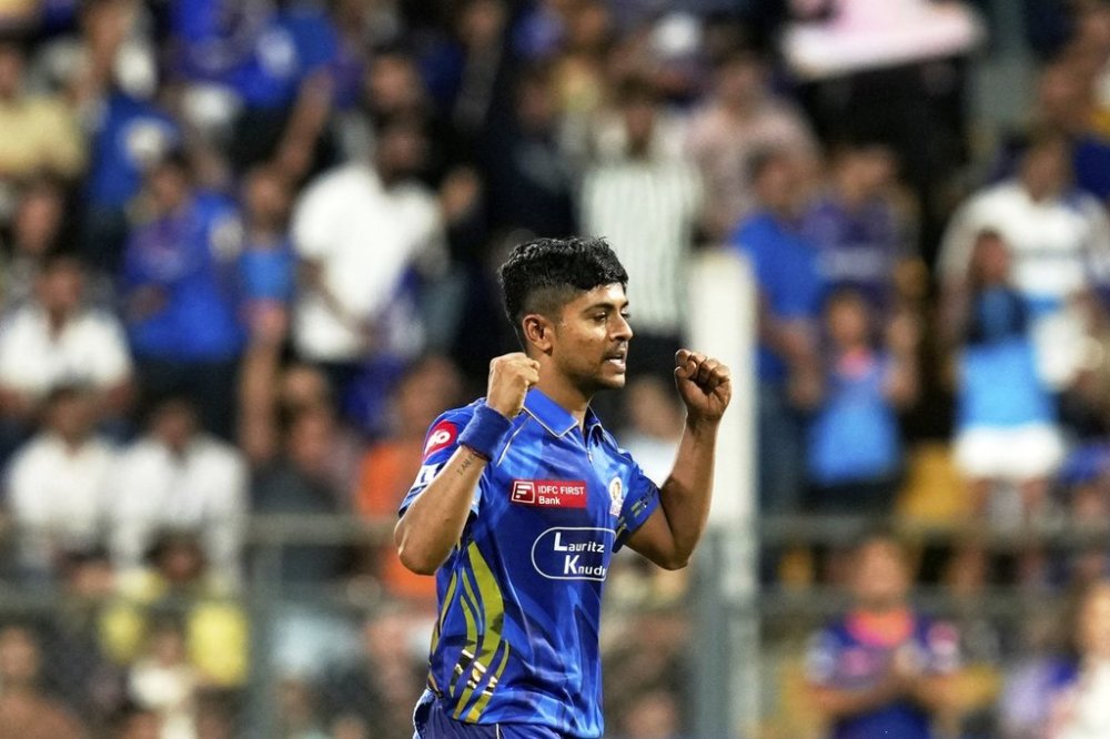 Mumbai Indians' Ashwani Kumar celebrates the dismissal of Kolkata Knight Riders' Rinku Singh during the Indian Premier League cricket match between Kolkata Knight Riders and Mumbai Indians at Wankhede Stadium in Mumbai, India, Monday, March 31, 2025. (AP Photo/Rajanish Kakade)