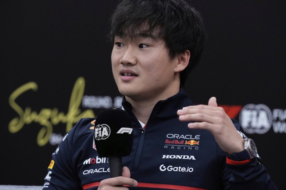 Red Bull driver Yuki Tsunoda of Japan responds to a journalist's question during a news conference at the Suzuka Circuit in Suzuka, central Japan, Thursday, April 3, 2025, ahead Sunday's Japanese Formula One Grand Prix race. (AP Photo/Hiro Komae)