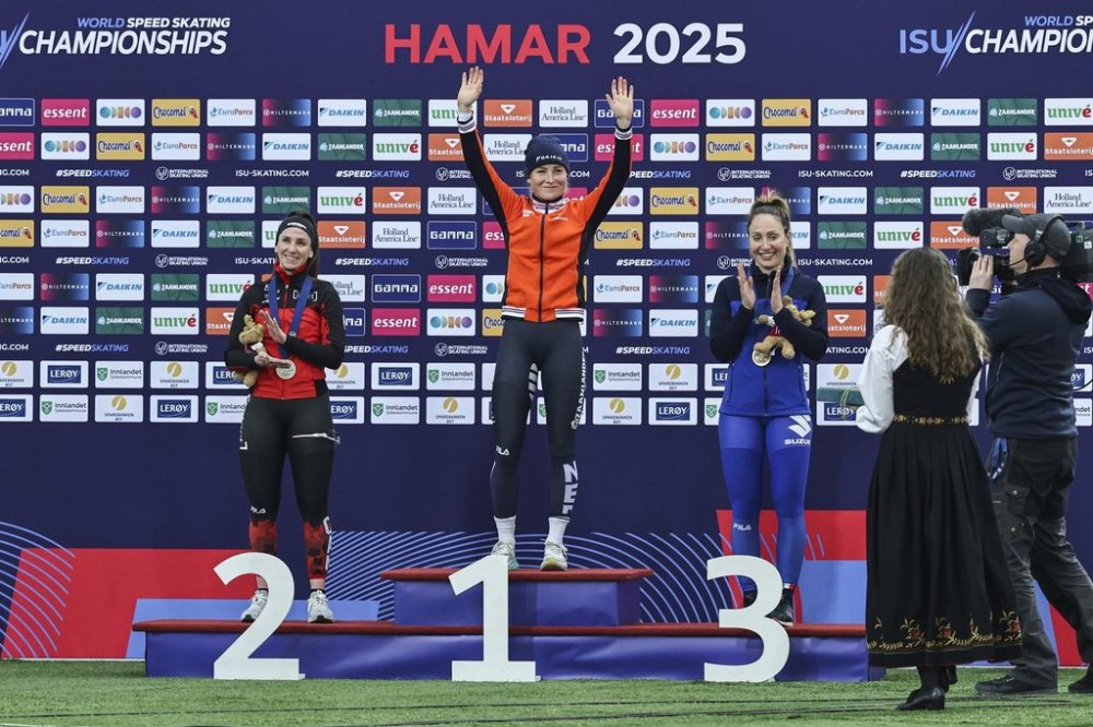Marijke Groenewoud from the Netherlands wins gold, centre, Ivanie Blondin from Canada wins silver, left, and Francesca Lollobrigida from Italy wins bronze in the women's mass start at the World Speedskating Single Distances Championships in Vikingskipet, Norway, Sunday, March 16, 2025. THE CANADIAN PRESS/AP-NTB Scanpix, Geir Olsen