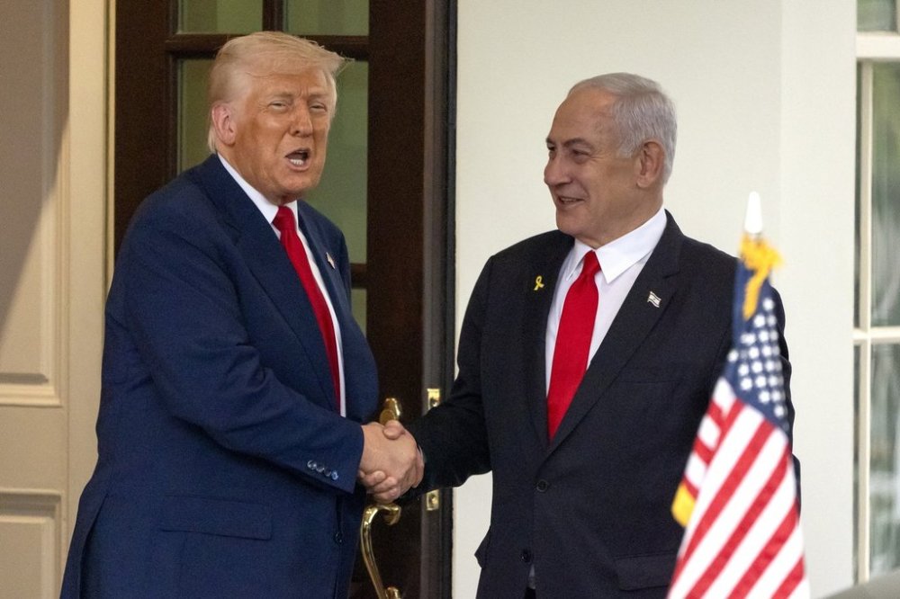 President Donald Trump, left, shakes hands with Israel's Prime Minister Benjamin Netanyahu as he leaves the West Wing of the White House, Monday, April 7, 2025, in Washington. (AP Photo/Mark Schiefelbein)