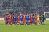 Members of the U.S. and Canadian teams stand together on the field before a SheBelieves Cup soccer match, Thursday, Feb. 16, 2023, in Orlando, Fla. THE CANADIAN PRESS/AP-Phelan M. Ebenhack