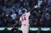 Minnesota Twins' Jose Miranda reacts after hitting a home run during the fourth inning of a baseball game against the Houston Astros, Saturday, April 5, 2025, in Minneapolis. (AP Photo/Stacy Bengs)