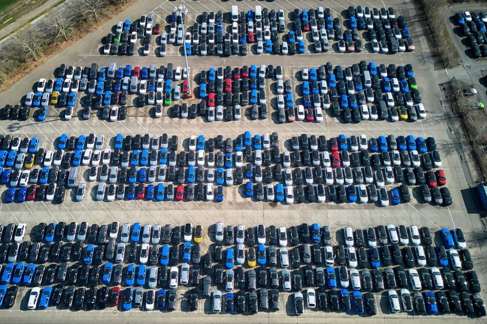 Opel cars are parked on the ground of the Opel car factory in Ruesselsheim near Frankfurt, Germany, Thursday, March 27, 2025. (AP Photo/Michael Probst)