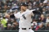 Chicago White Sox pitcher Sean Burke throws against the Los Angeles Angels during the first inning of an opening-day baseball game in Chicago, Thursday, March 27, 2025. (AP Photo/Nam Y. Huh)