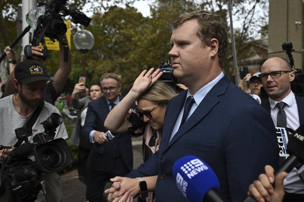 Kristian White, a former Australian police officer who was sentenced for killing a nursing home resident with a stun gun, leaves the Supreme Court of NSW, in Sydney, Friday, March 28, 2025. (AAP Image/Dean Lewins)