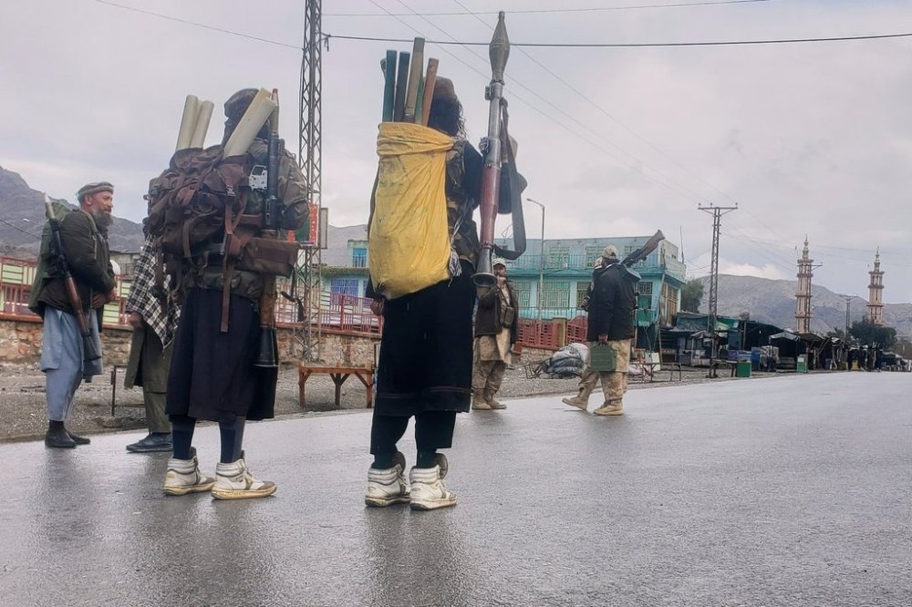 FILE - Taliban fighters stand near the closed Torkham border with Pakistan, where Pakistani and Afghan forces exchanged fire overnight, in Torkham, Afghanistan, Monday, March 3, 2025.(AP Photo/Shafiullah Kakar, file)