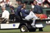 Seattle Mariners' Victor Robles holds his wrist after an injury in the ninth inning of a baseball game against the San Francisco Giants in San Francisco on Sunday, April 6, 2025. (Scott Strazzante/San Francisco Chronicle via AP)