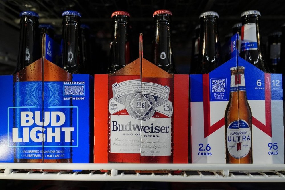 Six-packs of Bud Light, Budweiser and Michelob Ultra are displayed at a liquor store, Wednesday, Feb. 28, 2024, in Fairfield, Calif. (AP Photo/Godofredo A. Vásquez)