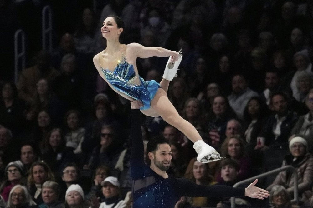 Deanna Stellato-Dudek and Maxime Deschamps, of Canada, perform during the pairs free skating program at the figure skating world championships, Thursday, March 27, 2025, in Boston. (AP Photo/Charles Krupa)