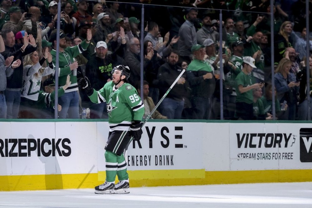 Dallas Stars center Matt Duchene skates toward the punch after scoring in the second period of an NHL hockey game against the Minnesota Wild in Dallas, Monday, March 24, 2025. (AP Photo/Gareth Patterson)