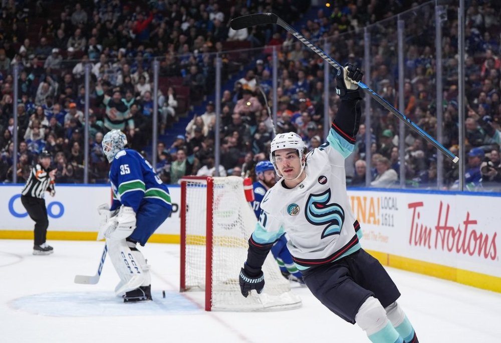 Seattle Kraken's Mikey Eyssimont celebrates his goal against Vancouver Canucks goalie Thatcher Demko during the first period of an NHL hockey game in Vancouver, on Wednesday, April 2, 2025. THE CANADIAN PRESS/Darryl Dyck