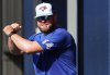 Toronto Blue Jays manager John Schneider talks with players during spring training in Dunedin Fla., on Saturday, Feb. 15, 2025. THE CANADIAN PRESS/Nathan Denette