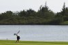 In this photo released by Xinhua News Agency, Takeda Rio of Japan plays a shot during the third round of the Blue Bay LPGA golf tournament in Lingshui, south China's Hainan Province, Saturday March 8, 2025. (Yang Guanyu/Xinhua via AP)