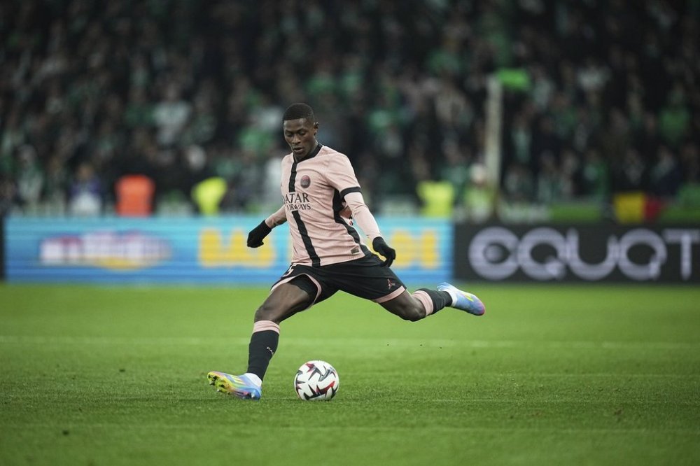 PSG's Ousmane Dembele kicks the ball during the French League One soccer match between Saint-Etienne and Paris Saint Germain at the Geoffroy-Guichard stadium in Saint-Etienne, France, Saturday, March 29, 2025. (AP Photo/Laurent Cipriani)