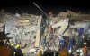 Rescuers work at the site of the Sky Villa Condo that collapsed In Friday's earthquake in Mandalay, Myanmar, Sunday, March 30, 2025. (AP Photo/Thein Zaw)