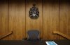 Judges bench at the Edmonton Law Courts building, in Edmonton on June 28, 2019. An Alberta judge has thrown out the case of a man accused of carrying counterfeit money because evidence showed the bills were very clearly Chinese knockoffs. THE CANADIAN PRESS/Jason Franson