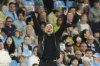 Manchester City manager Pep Guardiola gestures on the touchline during during the English Premier League soccer match between Manchester City and Wolverhampton Wanderers at Etihad Stadium, Manchester, England, Friday May 2, 2025. (Martin Rickett/PA via AP)