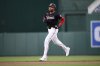 Washington Nationals' James Wood rounds the bases on his two-run home run during the first inning of a baseball game against the Los Angeles Dodgers, Tuesday, April 8, 2025, in Washington. (AP Photo/Nick Wass)