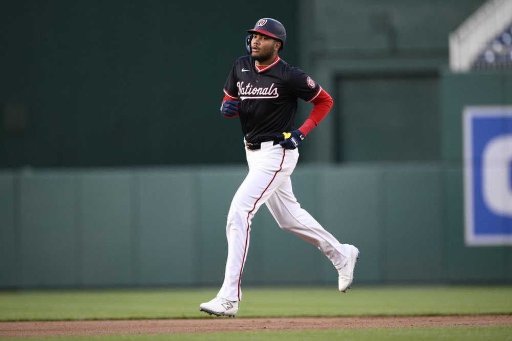 Washington Nationals' James Wood rounds the bases on his two-run home run during the first inning of a baseball game against the Los Angeles Dodgers, Tuesday, April 8, 2025, in Washington. (AP Photo/Nick Wass)