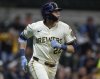 Milwaukee Brewers' Christian Yelich watches his two-run home run against the Houston Astros during the third inning of a baseball game, Monday, May 5, 2025, in Milwaukee. (AP Photo/Jeffrey Phelps)