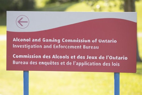 An Alcohol and Gaming Commission of Ontario Investigation and Enforcement Bureau sign is shown in Gananoque, Ont., on Friday, July 30, 2021. THE CANADIAN PRESS/Lars Hagberg