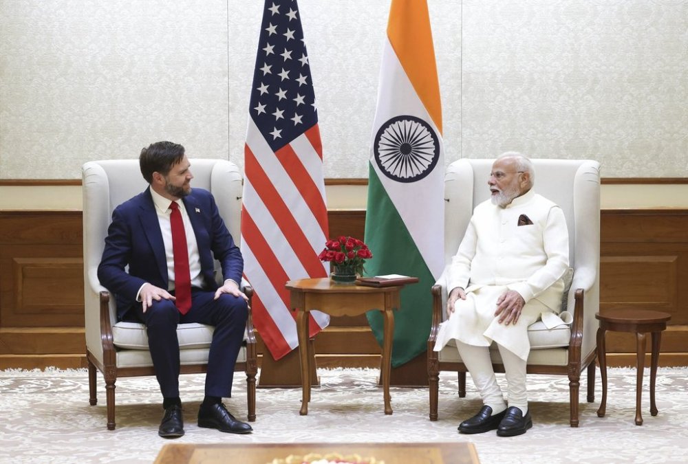 U.S. Vice President JD Vance talks with Indian Prime Minister Narendra Modi during a meeting in New Delhi, India, Monday, April 21, 2025. (Indian Prime Minister's Office via AP)